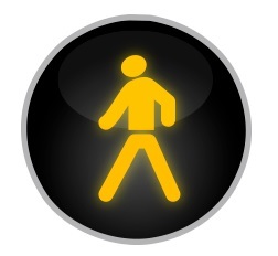 Dopravní značka Signál žlutého světla ve tvaru chodce